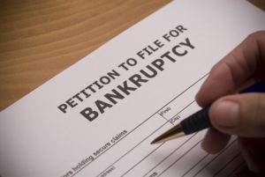 Is it better to file bankruptcy or just not pay debts
