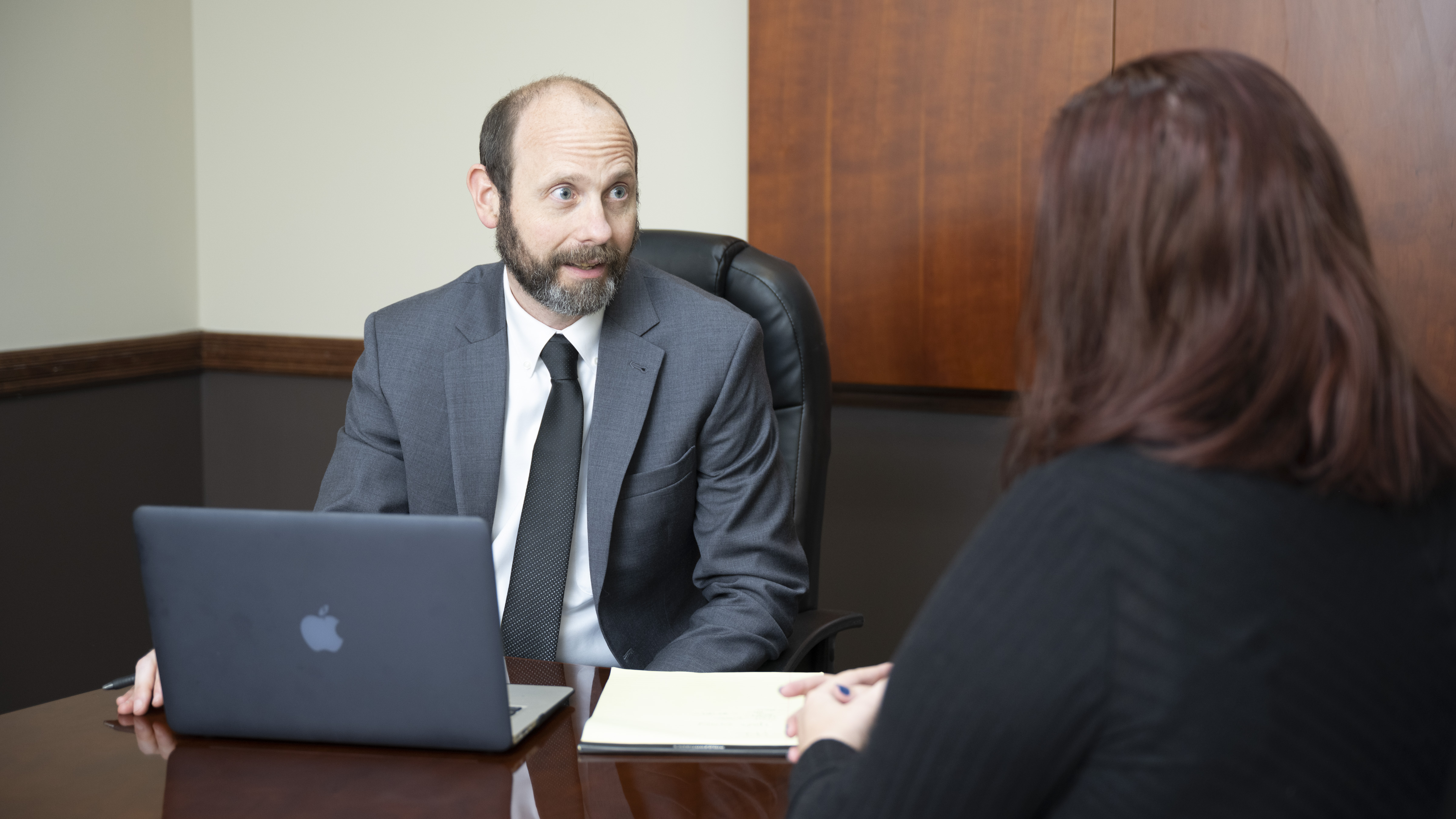 If you need a prenuptial agreement in Alabama, let our prenuptial agreement attorneys help. Prenuptial agreement attorney at The Harris Firm LLC consulting with a client in Alabama