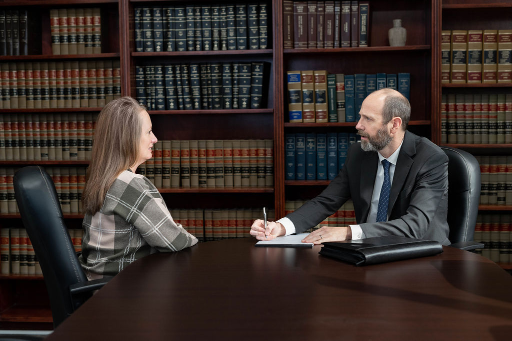 Steven A. Harris of The Harris Firm LLC meeting with a Talladega County divorce client