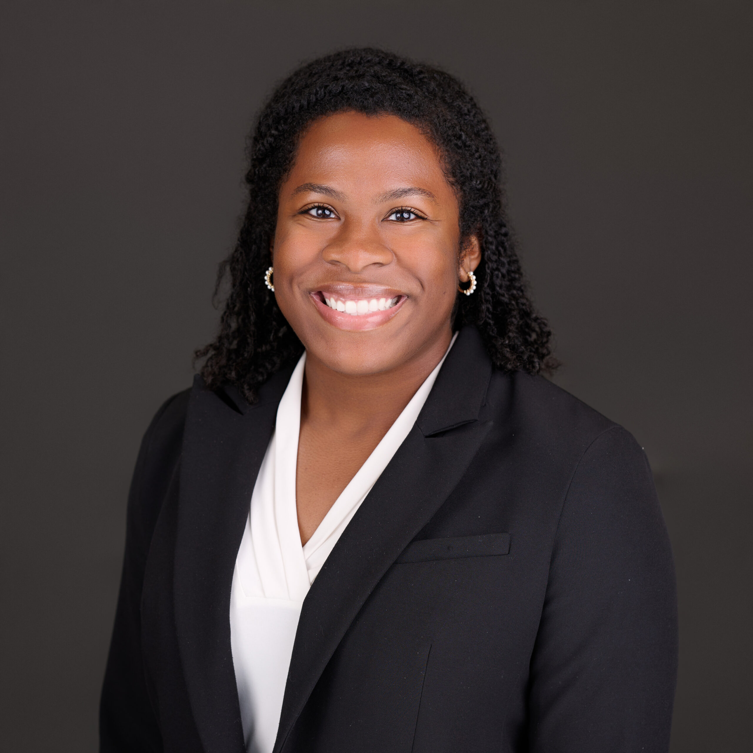 Birmingham family law attorney Paige Johnson of The Harris Firm LLC who drafts and reviews Alabama prenuptial and postnuptial agreements with attention to the three-prong enforceability test