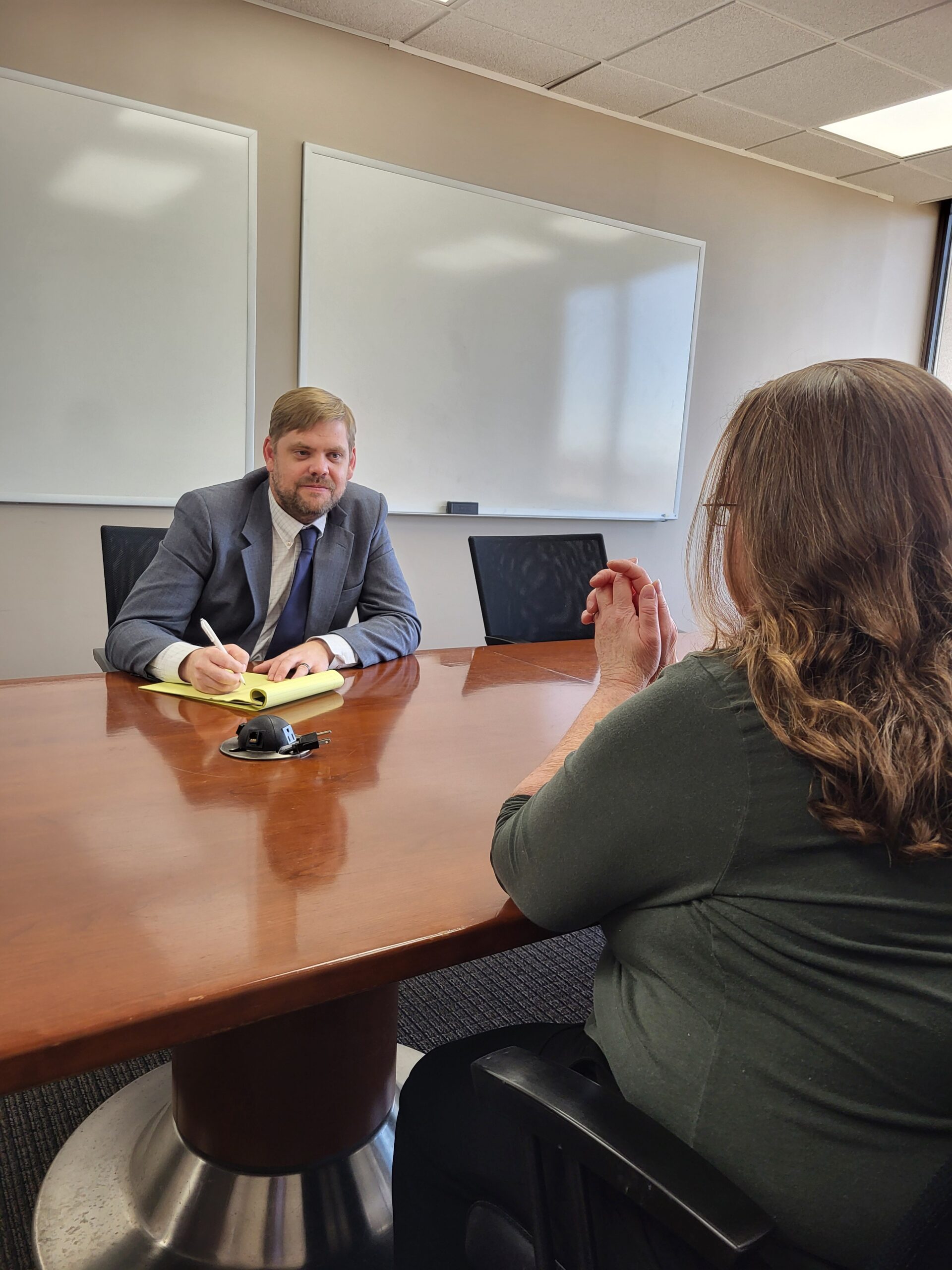 Montgomery family law attorney John Tyler Winans of The Harris Firm LLC reviewing marital and separate property classification with an Alabama divorce client